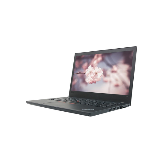 Laptop with a cherry blossom screen on a white background
