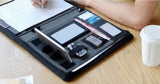 Executive Black Fabric & Leather Meeting Folder with Phone Holder, Card Slots, Pen Insert, Sticky Notes & Anti-Slip Elastic Band Description: Elevate your organizational game with this sophisticated